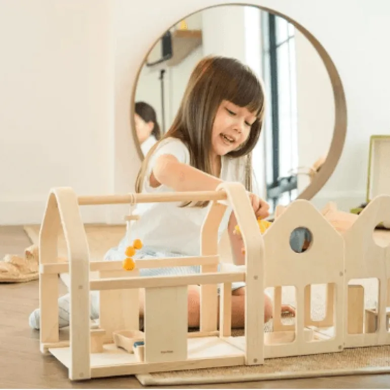 Plan Toys Slide N Go Dollhouse